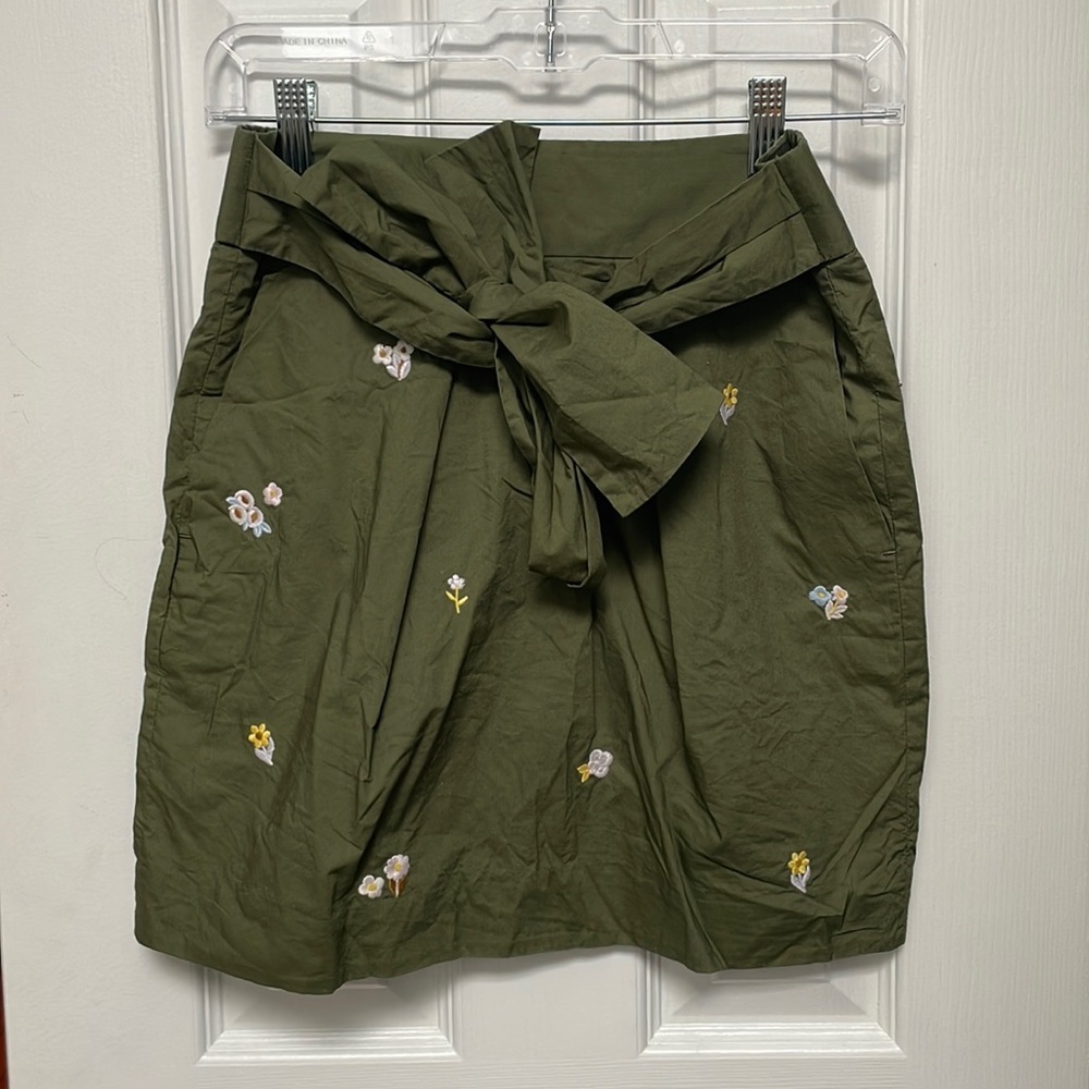 Green mini skirt with florals
